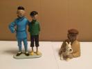 Statuette Tintin et Tchang + buste Tintin casquette No leblon, pixi, moulinsart